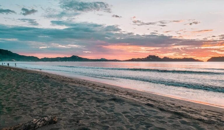 Colorful sunset over the ocean at Playa Potrero, Costa Rica.
