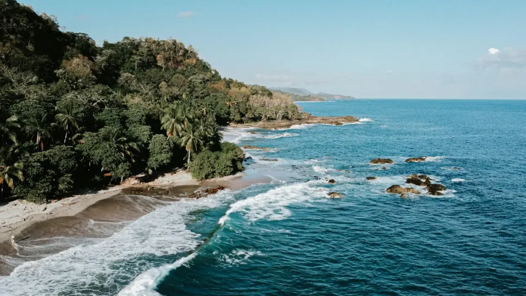 Waves breaking along the rocky tropical Pacific coastline near Playa Potrero, Guanacaste, Costa Rica