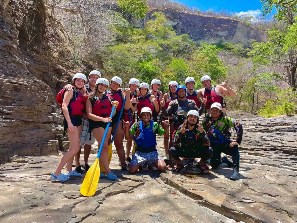Whitewater rafting group and guides on the Tenorio River, Guanacaste, Costa Rica