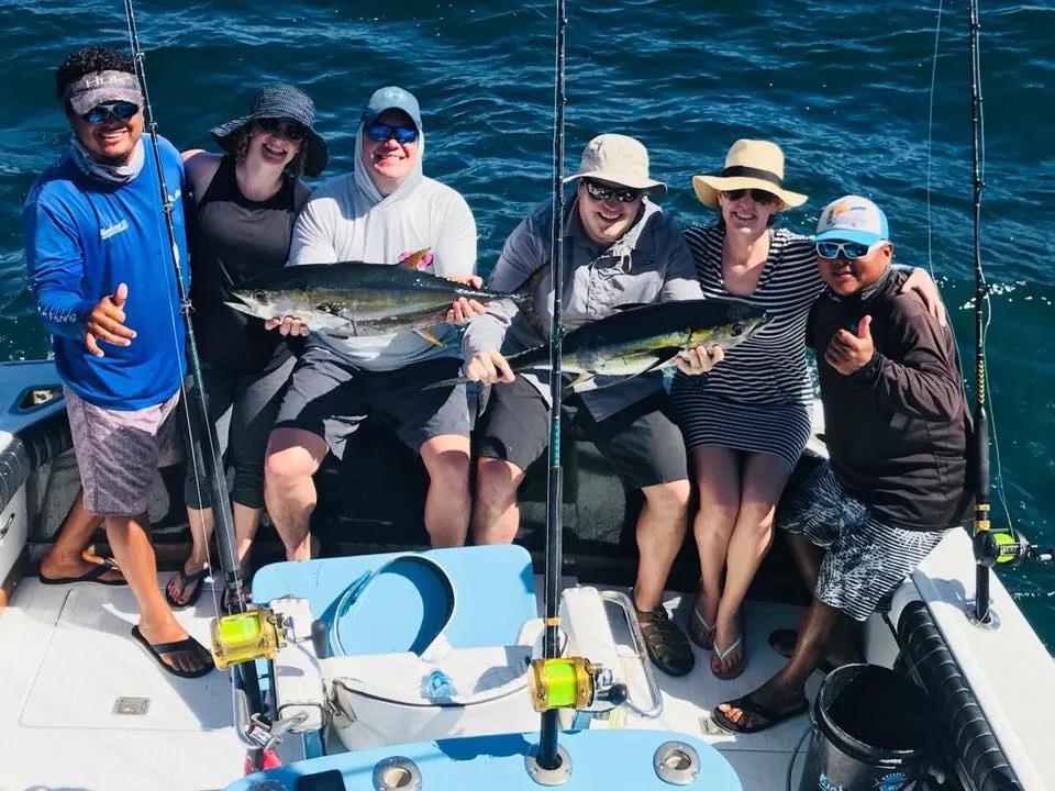Group of anglers with yellowfin tuna aboard a Wetass II fishing charter, Playa Flamingo