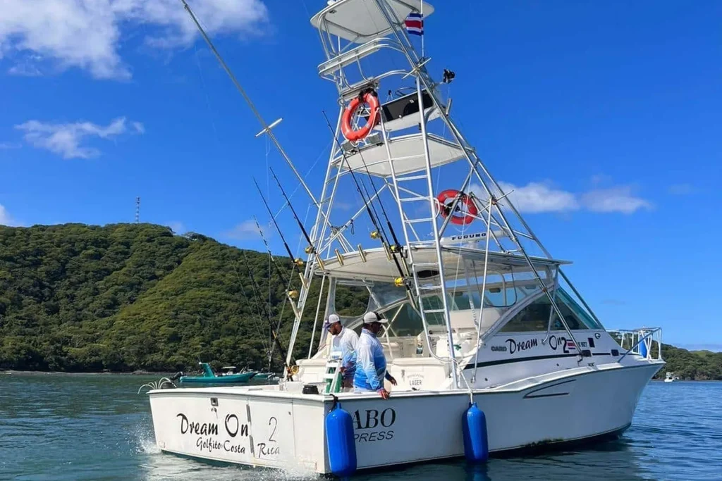 Dream On, a 35-foot Cabo Express sport fishing charter, anchored off Playas del Coco, Costa Rica