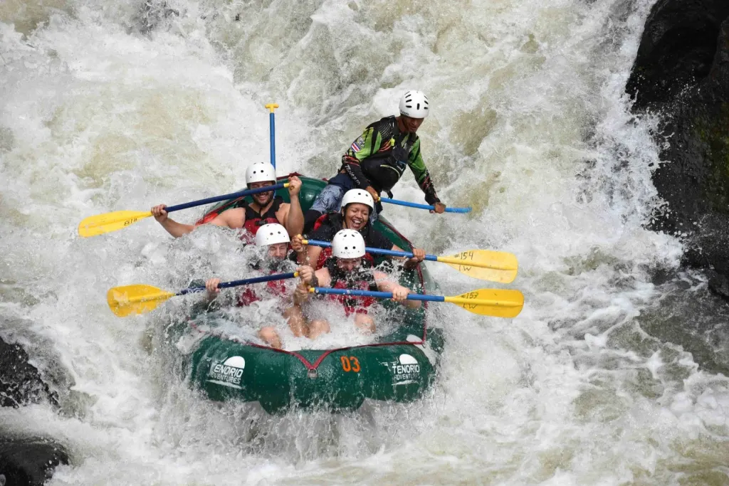 Rafters hitting big whitewater rapids on the Tenorio River, Guanacaste, Costa Rica