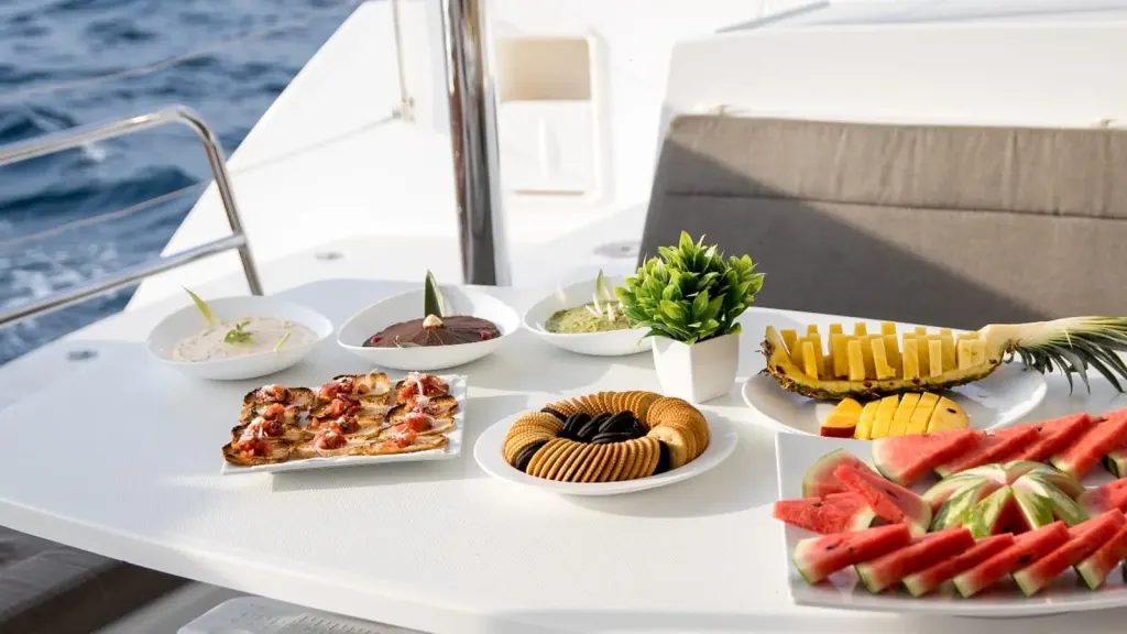 Fresh food spread served on deck during a Panache catamaran cruise, Costa Rica